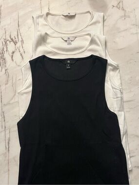 Bundle of 6 tank tops

Banana Republic Black & White Ribbed Tank Top 3 
Jcrew 3